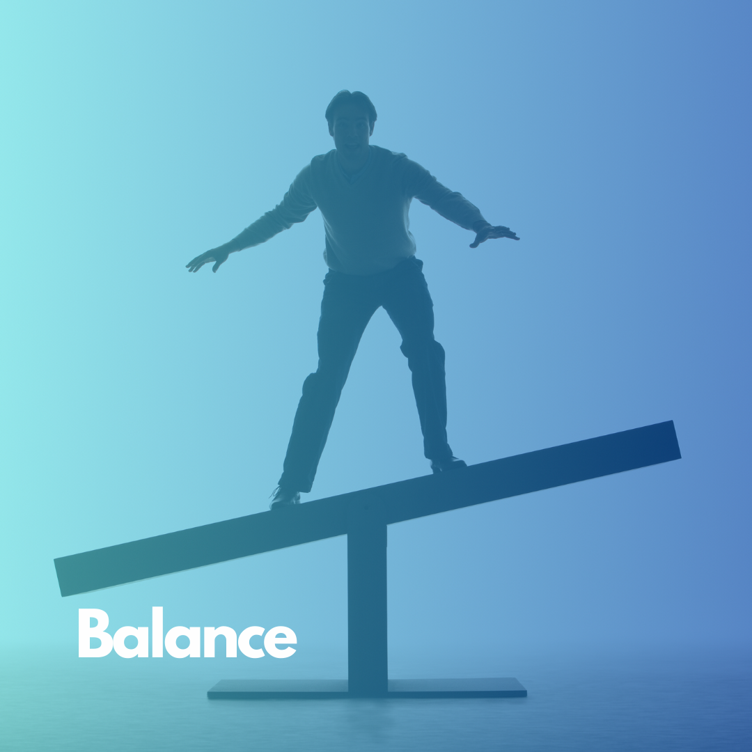 Man balancing on a giant seesaw